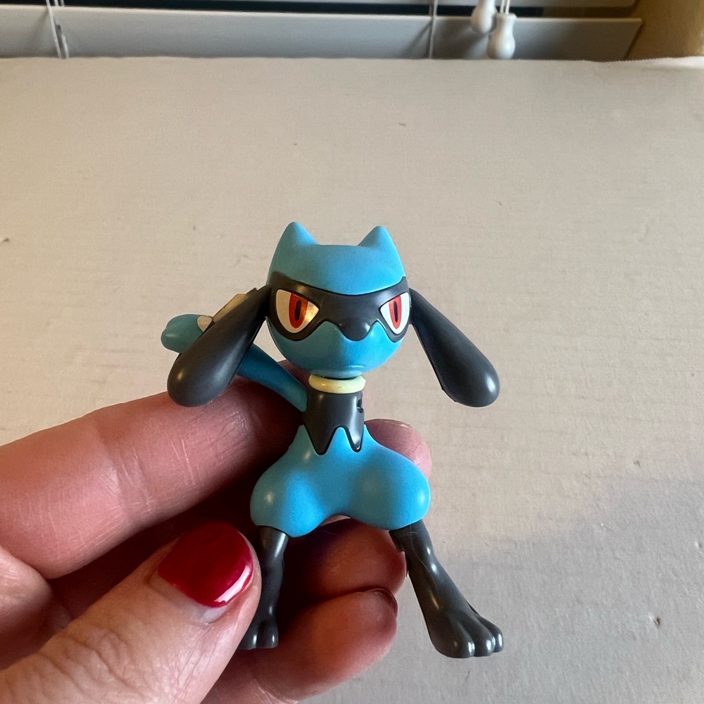 Blue and Black Action Figure